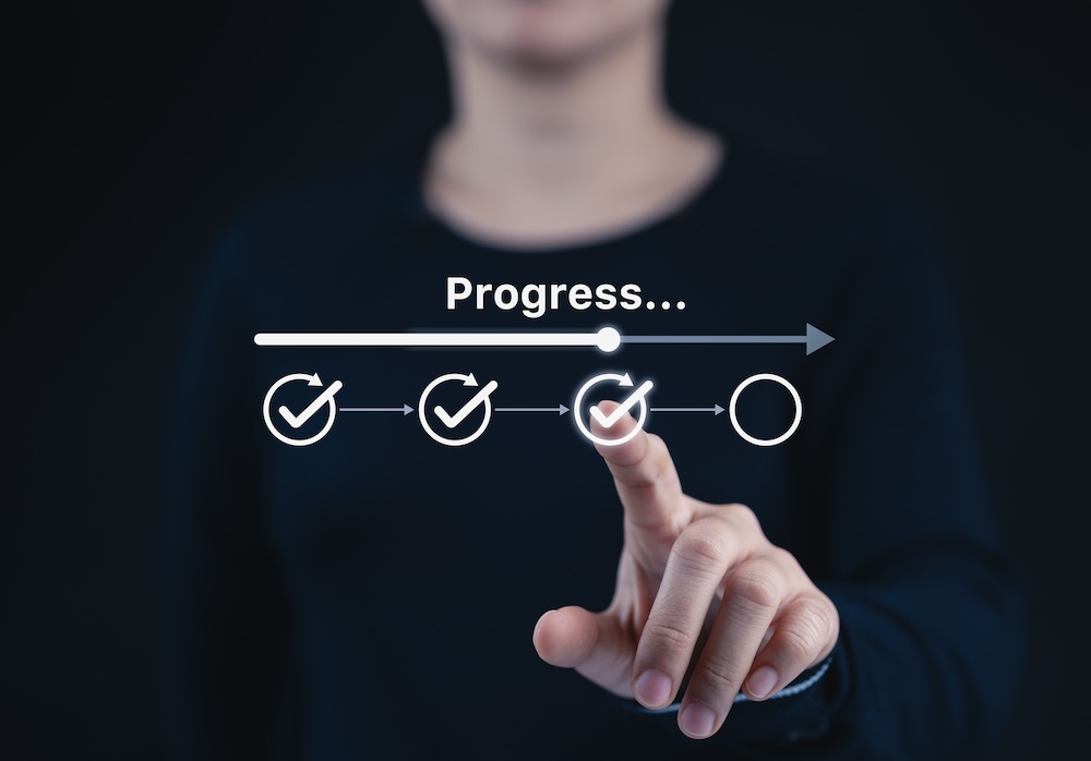 Checklist and task progress tracking concept. A person pointing at progress bar with checkmarks, task completion, productivity, workflow, goal setting, and efficient project management. loading bar,